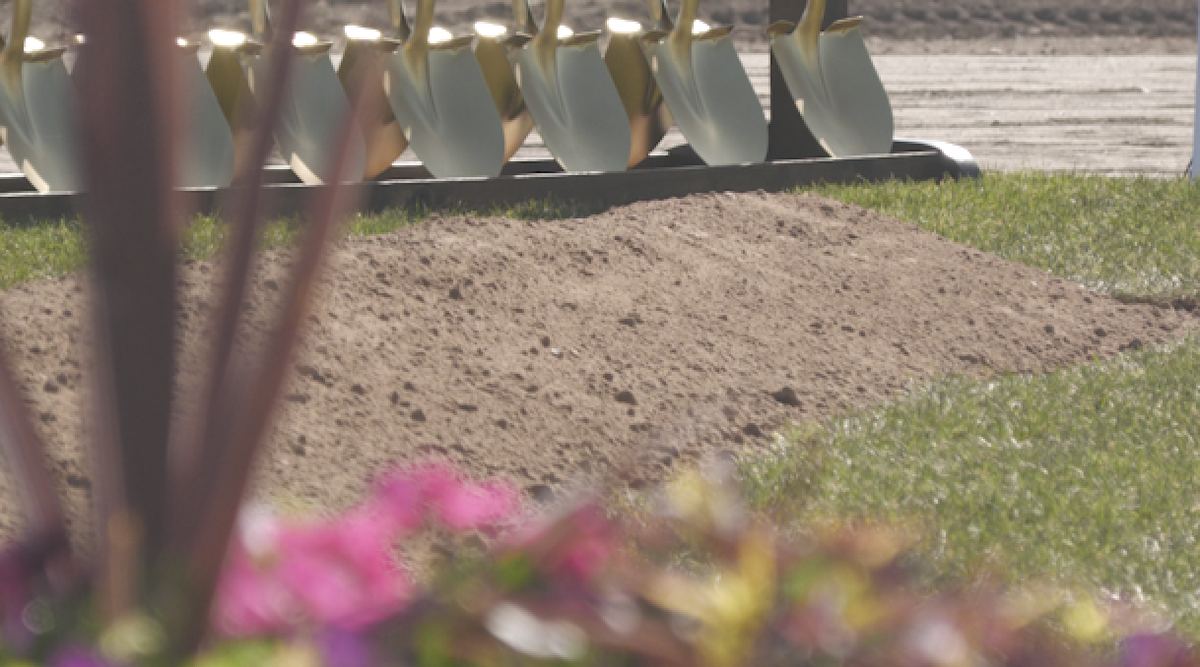 Ceremonial shovels and dirt mound ready for the ground breaking